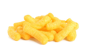 Many tasty cheesy corn puffs isolated on white