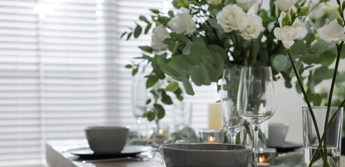 Festive table setting with beautiful tableware and decor indoors. Banner design