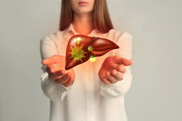 Woman and illustration of unhealthy liver on light grey background. Viral hepatitis - obrazy, fototapety, plakaty