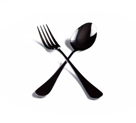 Cross spoon and fork isolated on a white background.