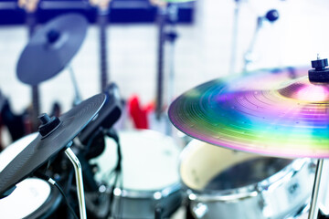 Selective focus to cymbals of drum set in music room. The concept of musical instrument.