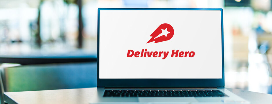 Laptop computer displaying logo of Delivery Hero