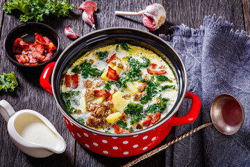 Zuppa Toscana,Tuscan Soup in red pot, top view