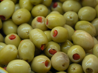 Green olives on the plate