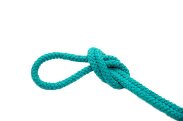 Knot on a cord isolated on a white background .