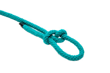 Knot on a cord isolated on a white background .