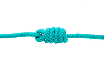 Knot on a cord isolated on a white background .