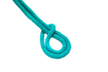 Knot on a cord isolated on a white background .