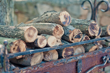 firewood lying in the grill.