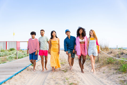 Group Of Young Best Friends Bonding Outdoors - Multiracial People Bonding And Having Fun At The Beach During Summer Vacation