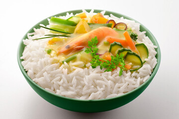 Green bowl with shrimp vegetables basmati rice and curry sauce