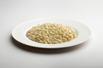 Parmesan cheese risotto in White dinner plate