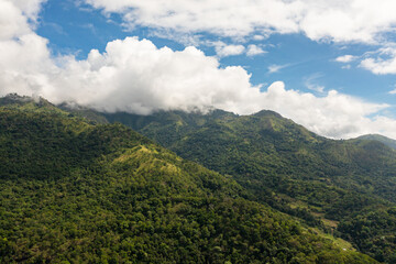 Aerial view of Tropical mountain range and mountain slopes with rainforest. Sri Lanka.