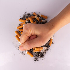 hand cigarette white stop pile