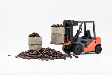 Simulation of transporting coffee beans using car models. Coffee beans in bag isolated on white.