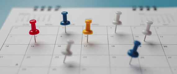 Embroidered red pins on a calendar event Planner calendar,clock to set timetable organize schedule,planning for business meeting or travel planning concept.