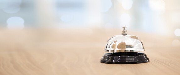 Metal service bells on wooden floor Service concept and customer assistance.