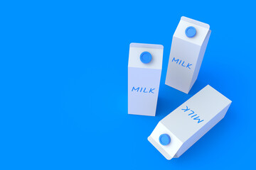 Carton packs of milk on blue background. Dairy beverage. Healthy drink. Copy space. 3d render