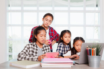 Student girls enjoy studying and learning from computer notebook pc, Back to school concept
