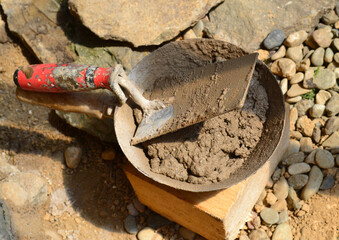 Trowel and ladle, plastering tools