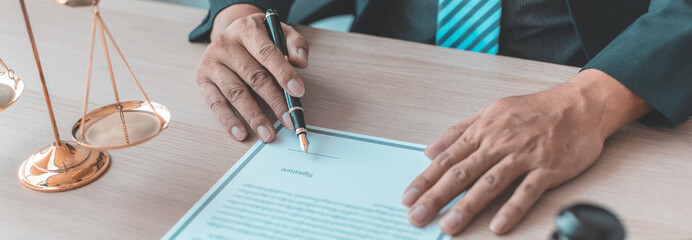 Lawyers or judges sign documents in accordance with legal and fair terms of agreement, Legal Ethics...