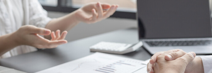 Brainstorm team, Marketers and financial accountants are discussing and analyzing charts to plan strategies to meet customer needs, Business data graph, Team meetings or business consulting.