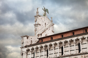 Lucca, Tuscany, Italy: detail of the ancient Roman Catholic church San Michele in Foro dedicated to...