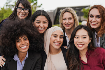 Multiethnic business women smiling on camera