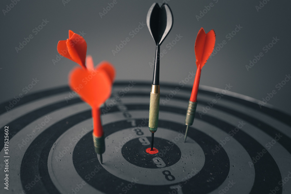Poster bullseye is a target of business. dart is an opportunity and dartboard is the target and goal. so bo