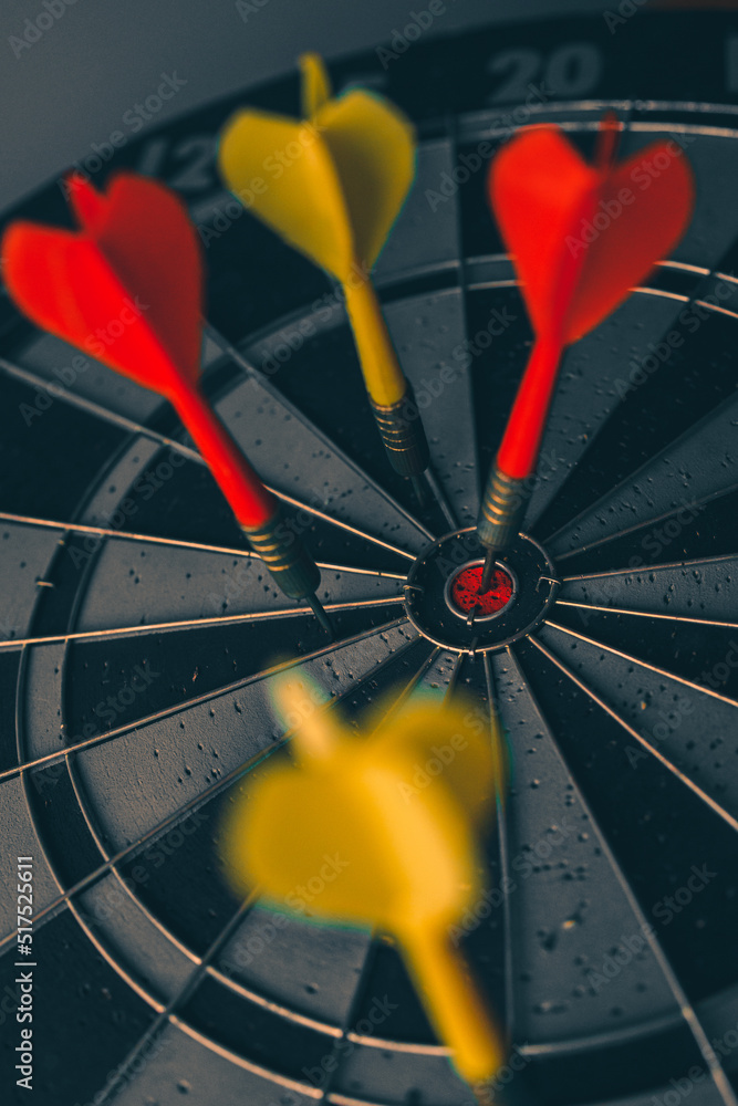 Poster bullseye is a target of business. dart is an opportunity and dartboard is the target and goal. so bo