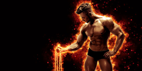 Fototapeta na wymiar Body builder with fit torso belly chest and arms biceps triceps muscles holding chain while posing over the black background with fire. Bodybuilding concept 