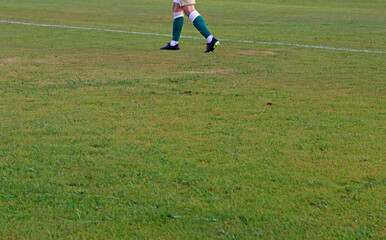 Football player on a natural grass field