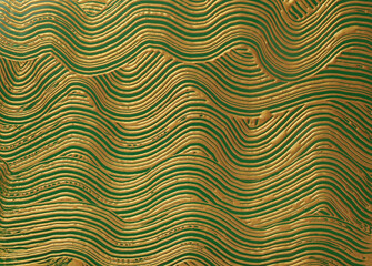 Abstract gold (bronze) and green color acrylic wave painting. Canvas stucco texture horizontal background.