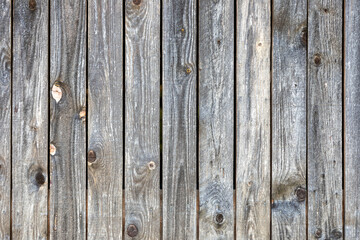 Grey barn wooden wall planking texture. hardwood dark weathered timber surface. old solid wood slats rustic shabby gray background. grunge faded wood board panel structure, close up