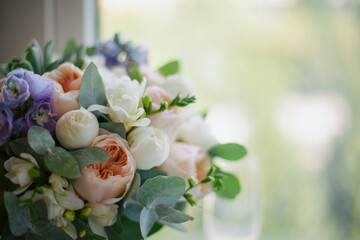 a wedding bouquet lies on the window. vintage toning. Wedding. The bride's bouquet. Wedding...