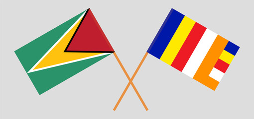 Crossed flags of Guyana and Buddhism. Official colors. Correct proportion