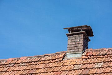Chimney - Clay tile roof - concept for roof - texture of roof shingles, banner texture for roofers