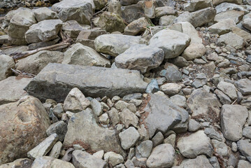 Mountain road in the Carpathians with large stones. Stone route to the mountains. Close-up of stones. Difficult path to the top of the mountain.