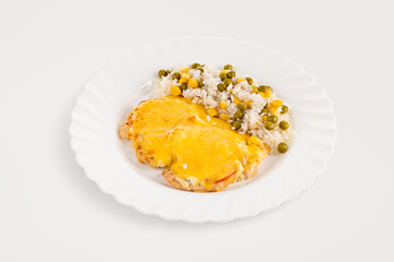 Chicken breast under a cheese cap with a side dish of rice with vegetables on a plate. Isolate on a white background, horizontal orientation, copy space