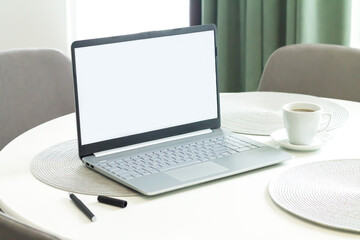 Fototapeta premium Open laptop with blank monitor screen mockup