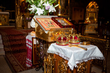 Vinnytsia, Ukraine. July 10, 2022. Crowns for a married couple during a wedding in a church
