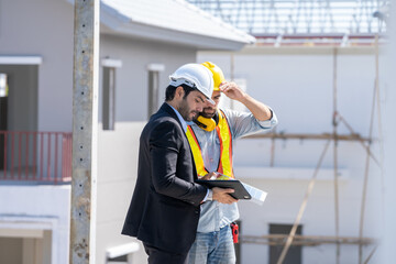 Engineer and businessmen discuss the construction of housing estates,Discussing planning,Development.