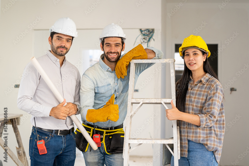 Aufkleber Group of engineer checking and talking about construction project with commitment to success at construction site,Construction concept.