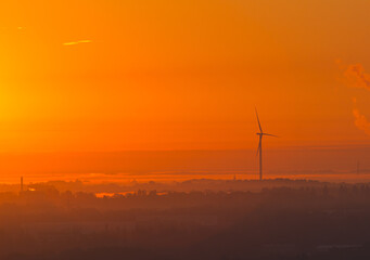 Wind turbines at sunset