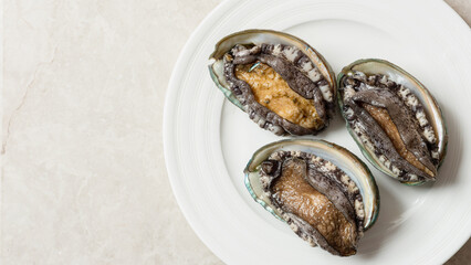 fresh abalone on a plate