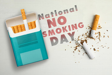 National No Smoking Day.Pack and cigarettes on white background, flat lay