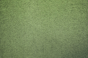 Texture of green plaster wall as background