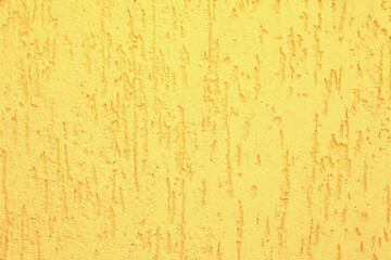 Texture of yellow plaster wall as background