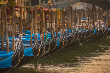 Moored Gondolas at the Canale Grande in Venice during sunset © Christian Schmidt 