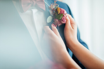 hands of the girl with a flower